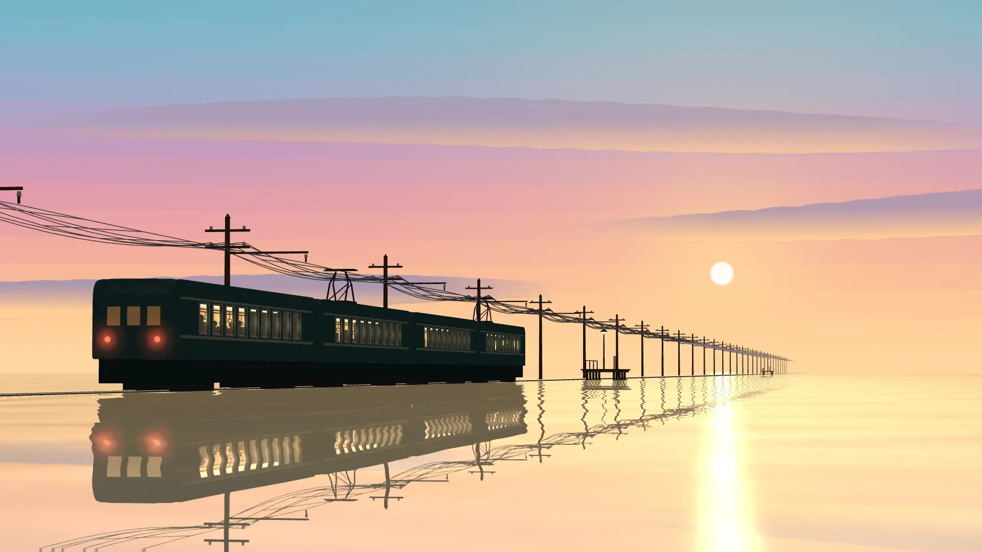 At dusk, a dark green four-car train crosses flooded rails with warm windows reflected in the water.